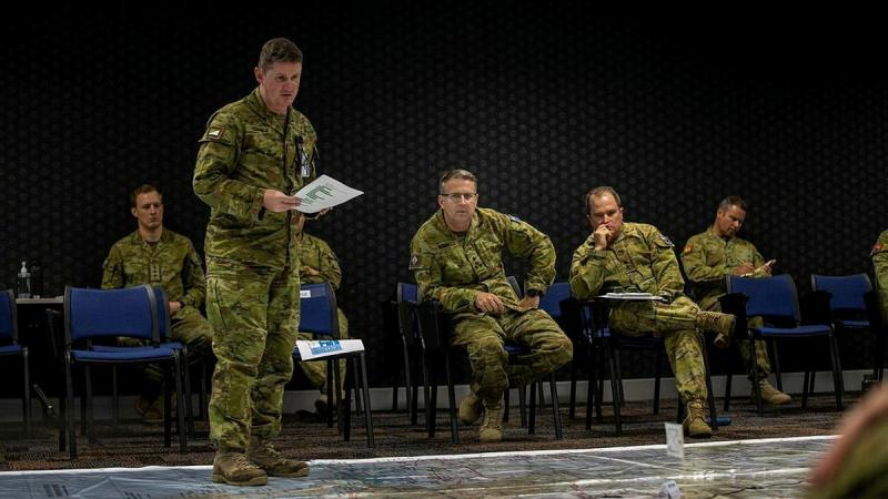 Major Brendon Coghill, of 2nd/14th Light Horse Regiment, provides a brief during Exercise Diamond Dawn. Photo: Corporal Nicole Dorrett 