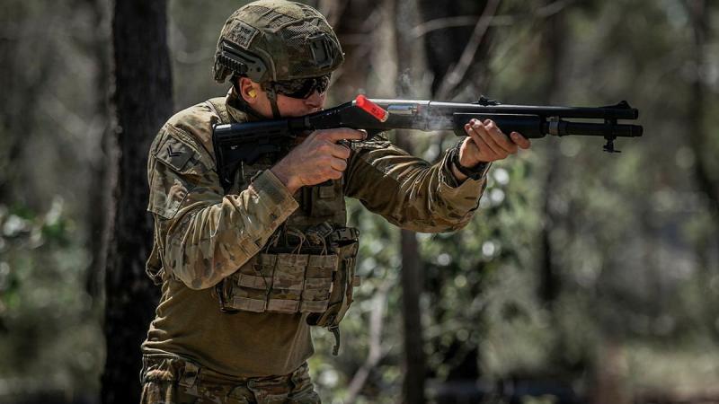 Corporal Shaun Abdilla, from the 6th Battalion, Royal Australian Regiment, fires a Remington 870 shotgun during a live-fire qualification shoot at the Greenbank Military Training Area, Brisbane. Photo: Private Jacob Hilton