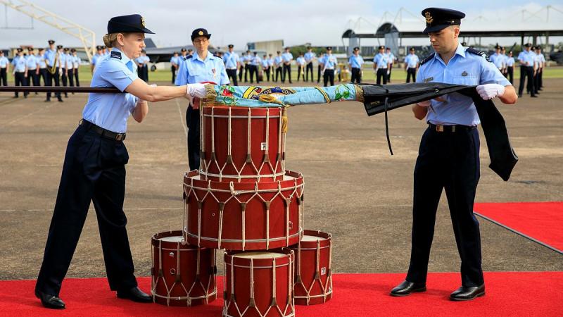 No. 3 Control and Reporting Unit Colours are unveiled during the Consecration of Colours parade held at RAAF Base Williamtown. Photo: Corporal Melina Young