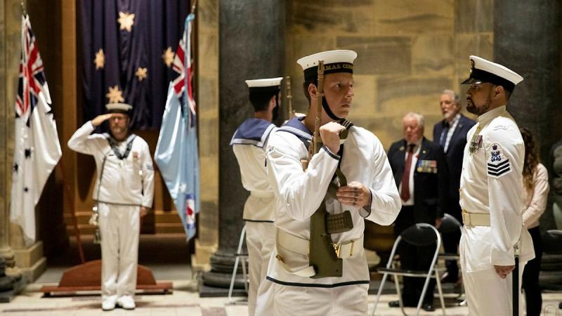 The catafalque party from HMAS Cerberus salutes during a service to commemorate the 79th anniversary of the Battle of Sunda Strait at the Shrine of Remembrance in Melbourne. Photo: Leading Seaman Bonny Gassner