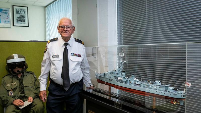 Gerry Shepherd with the scale model of HMAS Bataan he presented to the Navy History Section at the Sea Power Centre, Canberra. Photo: Sergeant Sebastian Beurich