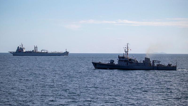 HMAS Sirius sails past Philippine Navy ship BRP Emilio Jacinto during a passage exercise in the Sulu Sea. Photo: Leading Seaman Thomas Sawtell