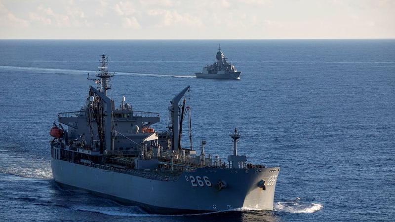 HMAS Sirius, left, and HMAS Anzac conduct a routine passage exercise in the South China Sea as part of their deployment throughout the north-east Indian Ocean and south-east Asia. Photo: Leading Seaman Thomas Sawtell