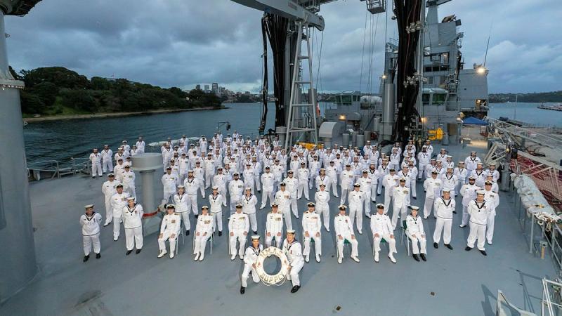 The commissioning crew of NUSHIP Supply stands on the deck while berthed alongside FBE on March 18.  Photo: Able Seaman Daniel Goodman