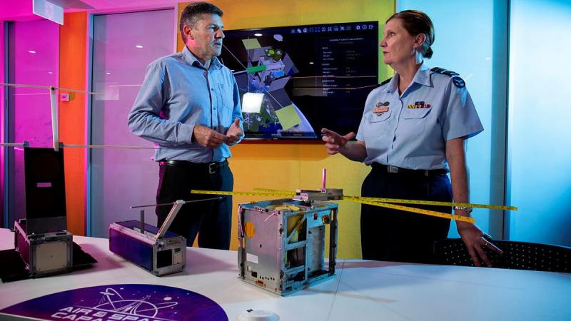 Head of Air Force Capability Air Vice Marshal Catherine Roberts speaks with Professor Russell Boyce about the M2 CubeSat at the University of New South Wales Canberra. Photo: Sergeant Oliver Carter