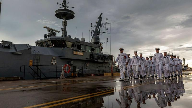 Commanding Officer HMAS Pirie Lieutenant Commander Sean Dalton leads the ship's company as they march off after the patrol boat’s decommissioning at HMAS Coonawarra in Darwin. Photo: Leading Seaman Shane Cameron