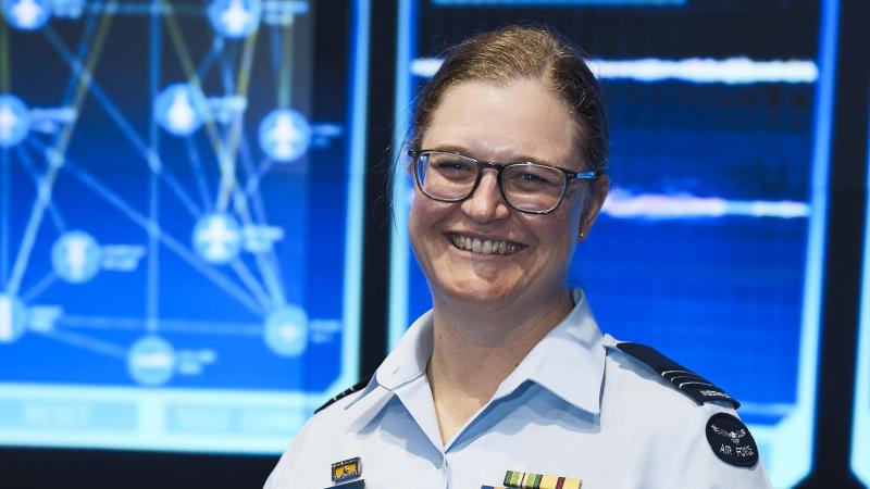 Squadron Leader Kate Yaxley lectures and mentors students at UNSW Canberra. 