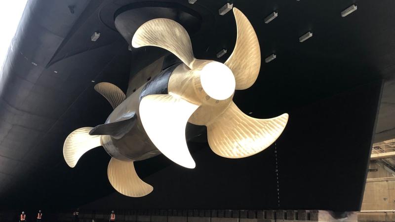 The completed pod installation includes a new four-blade propeller arrangement.