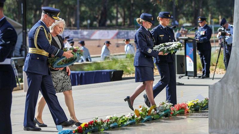 Chief of Air Force Air Marshal Mel Hupfeld, left, his wife Louise Hupfeld, Warrant Officer of the Air Force Fiona Grasby, and Leading Aircraftwoman Victoria Farell lay wreaths at the Air Force memorial. Photo: Leading Aircraftwoman Jacqueline Forrester