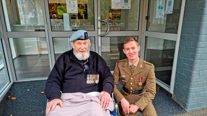 Ex-Corporal George Hepburn, Vietnam veteran of 161st (Independent) Reconnaissance Flight with Craftsman Cameron Powell at Broomfield, Victoria.