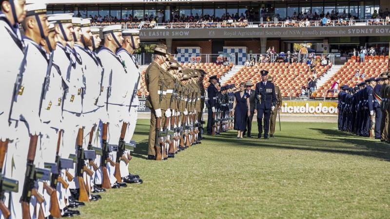 Officer Commanding Australia’s Federation Guard Squadron Leader Stephen Airey escorts the NSW Governor Margaret Beasley as she reviews the royal guard during the opening ceremony of the Easter Show. Photo: Corporal Dan Pinhorn