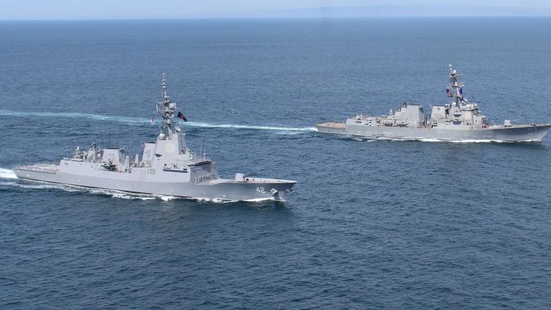 HMAS Sydney and USS John Finn conduct a passage exercise in the Southern California Exercise Area in the United States.