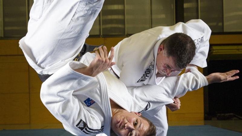 ADF Judoka Major Derek Morris throws Staff Cadet Callum Webb at the ADFA Gymnasium, Canberra. Photo: Petty Officer Lee-Anne Cooper