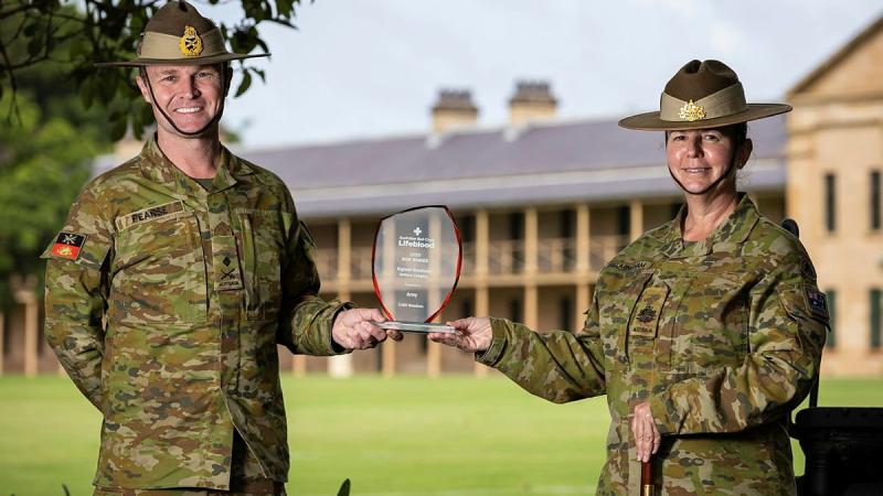 Commander Forces Command Major General Matthew Pearse and Command Sergeant Major Warrant Officer Class One Kim Felmingham hold the trophy on behalf of Army at Victoria Barracks, Sydney. Photo: Sergeant Nunu Campos