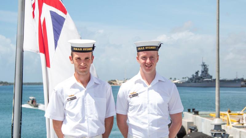 Seaman Sebastien Schultz and Seaman Jack Woolmer on their first international port visit on board HMAS Sydney in Pearl Harbor. Photo: Able Seaman Jasmine Mood