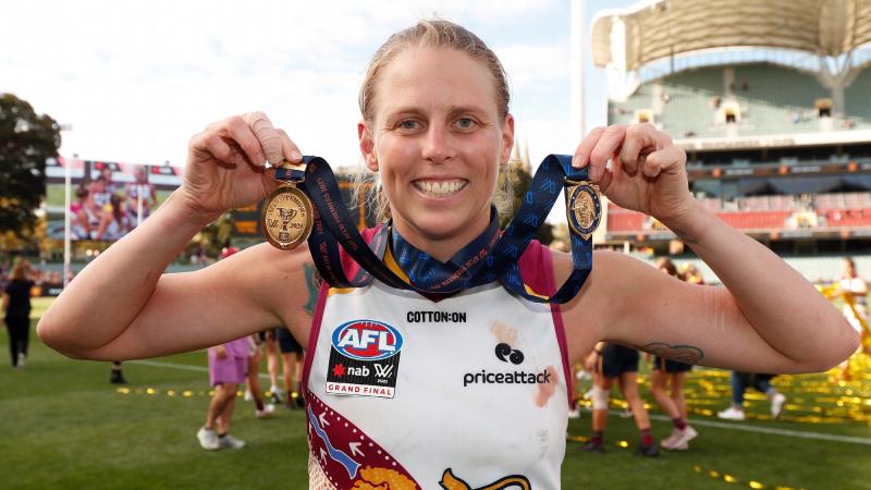 Corporal Kate Lutkins celebrates after winning the best-on-ground award during the 2021 AFLW grand final match. Photo: Michael Willson/AFL Photos