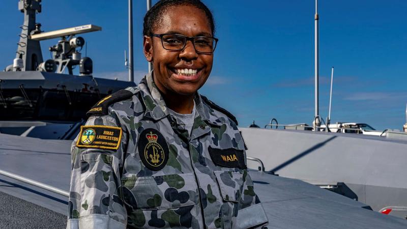 Able Seaman Michaelyn Waia on the forecastle of HMAS Launceston alongside HMAS Coonawarra, Darwin. Photo: Leading Seaman Shane Cameron