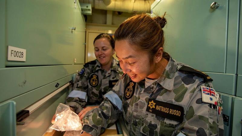 Leading Seaman Tayler Hawkins, left, and Able Seaman Katie Nattrass Russo conduct a stores muster on board HMAS Ballarat during the ship's current regional presence deployment. Photo: Leading Seaman Ernesto Sanchez