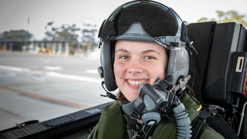 Cadet Under Officer Grace Wilton in the rear seat of a PC-21 aircraft prior to a flight over Adelaide with Aircraft Research and Development Unit pilot Squadron Leader Samuel Da Graca Costa. Photo: Leading Aircraftman Sam Price