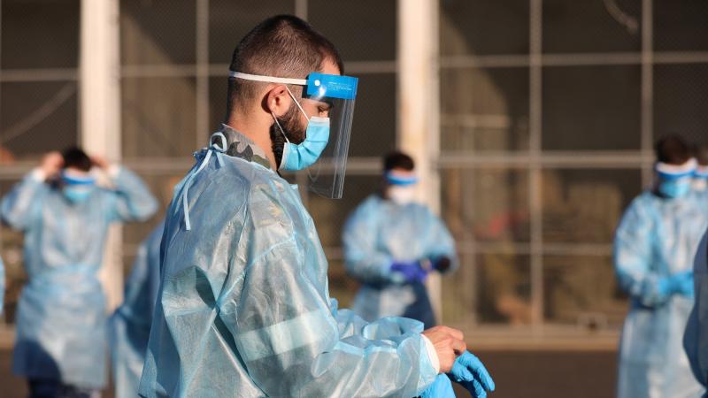 Seaman Jack Foulstone practices correct application of Personal Protective Equipment (PPE) in preparation for their deployment on Operation COVID-19 Assist. Photo: Captain Kristen Daisy Clelend