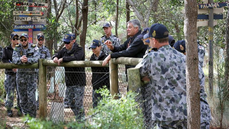 Willum Warrain Aboriginal Association executive officer Peter Aldenhoven, centre, takes maritime human resources officer course members on a tour of the Koorie bush tucker trail, during their visit to the association. Photo: Leading Seaman James McDougall