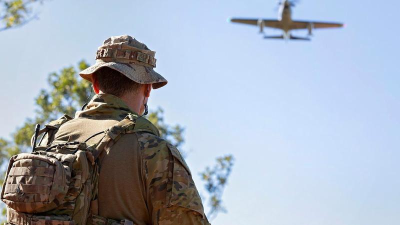 An Army member participating in the No. 67 Joint Terminal Attack Controller Course confirms target coordinates during Exercise Black Dagger 21-1 held out of RAAF Base Tindal in the Northern Territory. Photo: Corporal Nicci Freeman