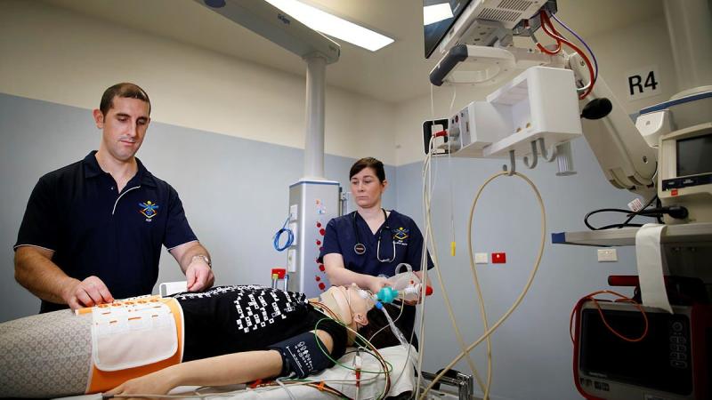 Medical technicians from No. 2 Expeditionary Health Squadron Leading Aircraftman Christopher Griffiths and Corporal Stacey Lesbirel at John Hunter Hospital Emergency Department. Photo: Corporal Melina Young