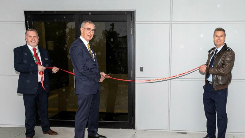 Moog Australia Managing Director, Bryan O'Connor, left, Victorian Defence Industry Advocate John O'Callaghan, centre, and Director General Joint Strike Fighter Air Commodore Damien Keddie, right, at Factory Four in Heatherton, Victoria.