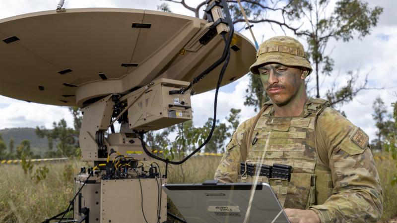Signaller Joel Mula, of the 3rd Combat Signal Regiment, deployed to Townsville Field Training Area as a telecommunications technician on Exercise Polygon Wood. Photo: Corporal Brodie Cross