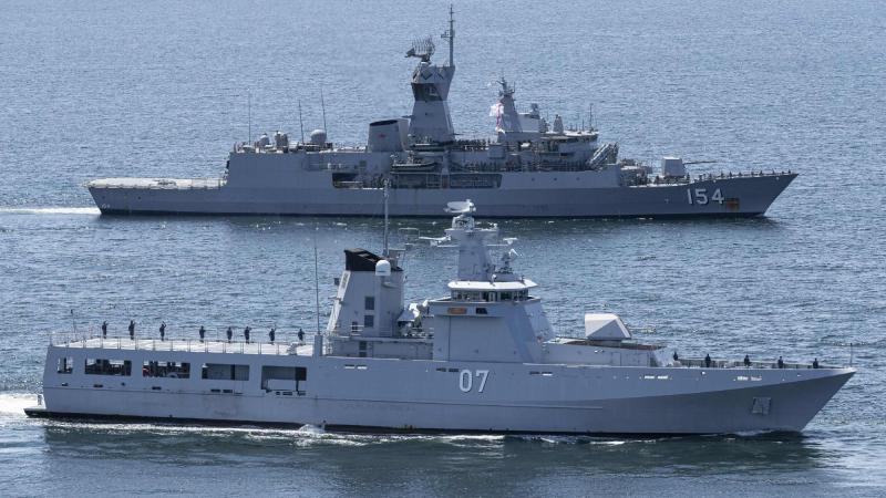 HMAS Parramatta sails in company with Royal Brunei Navy ship KDB Darulehsan while conducting maritime manoeuvres. Photo: Leading Seaman Jarrod Mulvihill