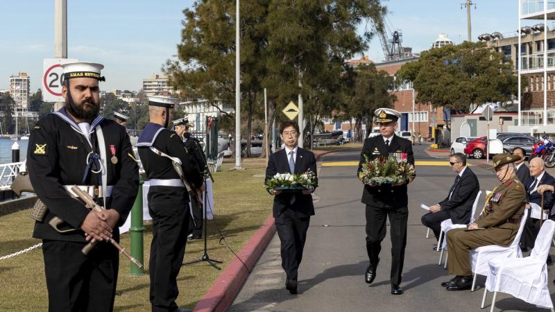 Commander Australian Fleet Rear Admiral Mark Hammond and Consul-General of Japan Kiya Masahiko prepare to lay wreaths during the memorial service at HMAS Kuttabul. Photo: LSIS Leo Baumgartner