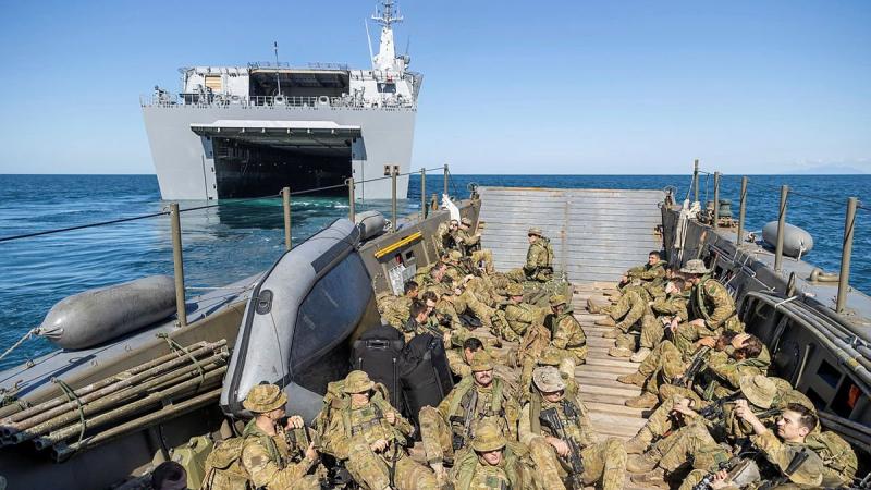 Soldiers from the 2nd Battalion, Royal Australian Regiment, on board an Australian Army LCM-8 landing craft depart HMAS Canberra for beach landing serials during Exercise Sea Explorer. Photo: Leading Aircraftwoman Jacqueline Forrester