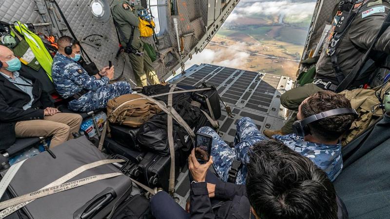 Personnel attending the Air Lift Systems Program Office C-27J Senior Partnering Board experience a RAAF C-27J Spartan tactical flying. Photo: Corporal Dan Pinhorn