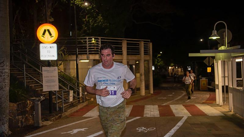 Major Nicholas Chamberlin, of the 1st Signal Regiment, takes part in the Darkness to Daylight event in Brisbane.