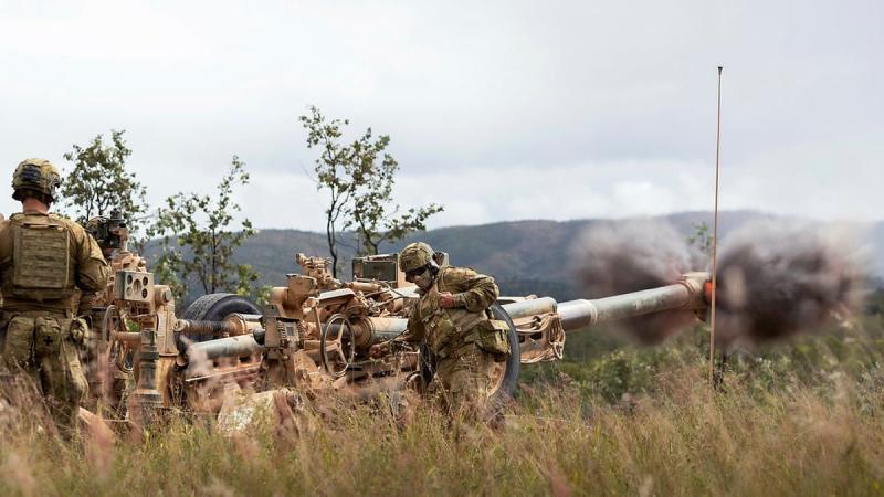 Soldiers from 4 Regiment, Royal Australian Artillery, fire an M777 Howitzer during a fire mission on Exercise Chau Pha at Townsville Field Training Area. Photo: Corporal Sagi Biderman