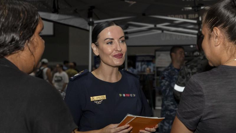 Defence Force Recruiting specialist, Sergeant Donna Hayes talks with two women about a career in the Defence Force during the Women in Defence Careers Expo. Photo Jacob Joseph