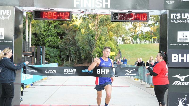 Sergeant Kieren Perkins winning his age category in the Brisbane Half Marathon.