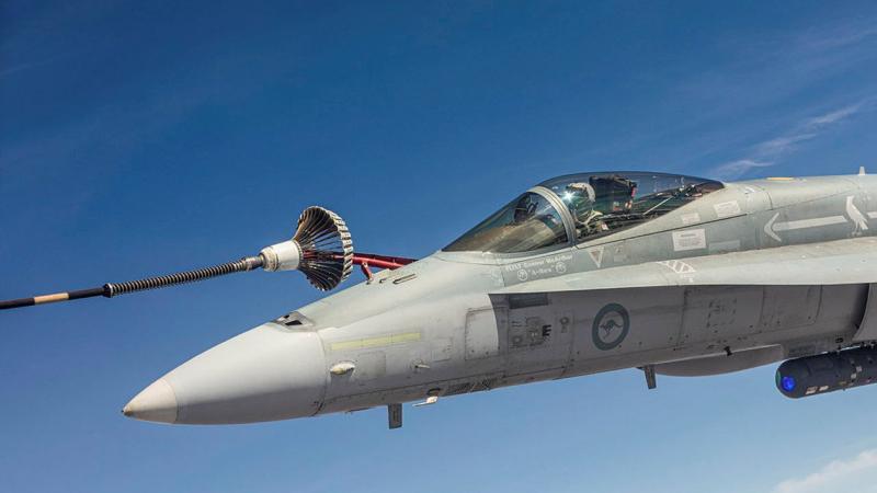 F/A-18A Hornet A21-008 refuels in the air over the Northern Territory during Exercise Arnhem Thunder. Photo: Leading Aircraftman Stewart Gould