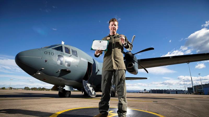 Air Mobility Training and Development Unit loadmaster Sergeant Robert McGavock with a US Army Achievement Medal presented to him by the United States Army Special Operations Command. Photo: Corporal David Said