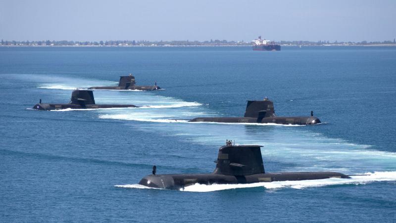 Collins-class submarines HMA Ships Collins, Farncomb, Dechaineux and Sheean in formation while transiting through Cockburn Sound, Western Australia. Photo: Lieutenant Chris Prescott