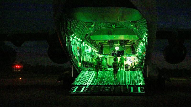 An Air Force aircraft security operations team on the ramp of a C-17A Globemaster III at RAAF Base Amberley during Exercise Precision Gauntlet. Photo: Corporal Brett Sherriff