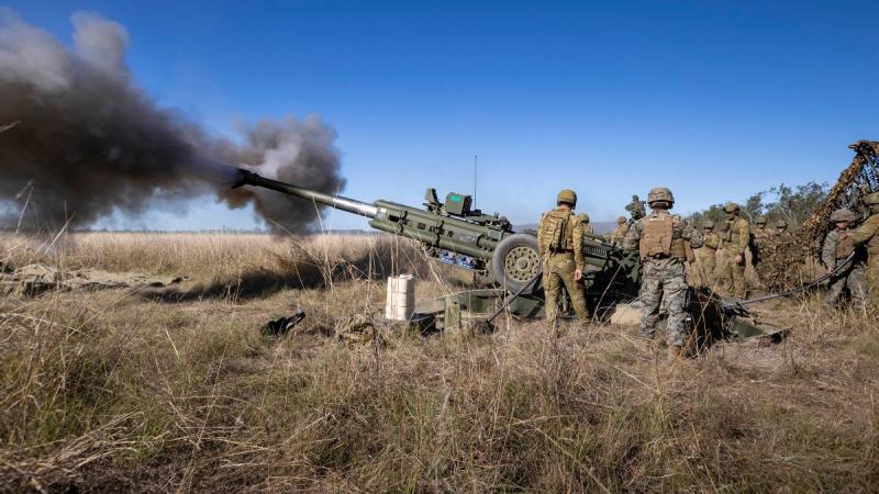 Royal Australian Artillery and the United States Marine Corps fire an Australian M777 Howitzer at Shoalwater Bay Training Area during TS21. Photo: Trooper Jarrod McAneney 