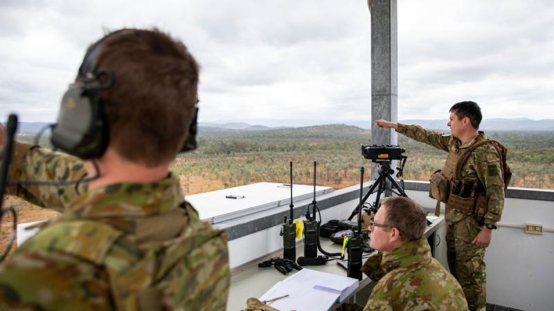 Australian Army Joint Terminal Attack Controllers and New Zealand Army personnel confirm target coordinates while conducting training serials at the Townsville Field Training Area in QLD, during Exercise Talisman Sabre 2021. Photo: LACW Emma Schwenke