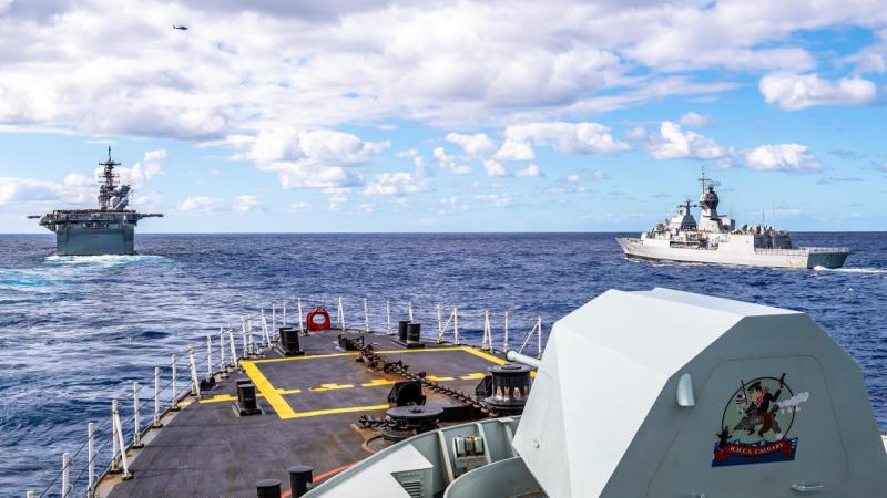 Canadian frigate HMCS Calgary (foreground), in company with USS America (left) and Australian frigate HMAS Parramatta (right) off the coast of QLD, during Exercise Talisman Sabre 21. Photo: Corporal Lynette Ai Dang