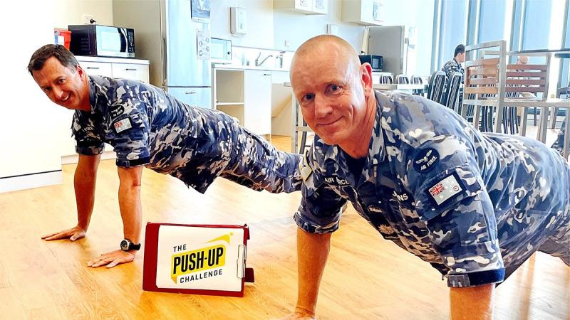 Squadron Leader Nicholas Willers, left, and Warrant Officer Martin Johns during the challenge at RAAF Base Williamtown. 