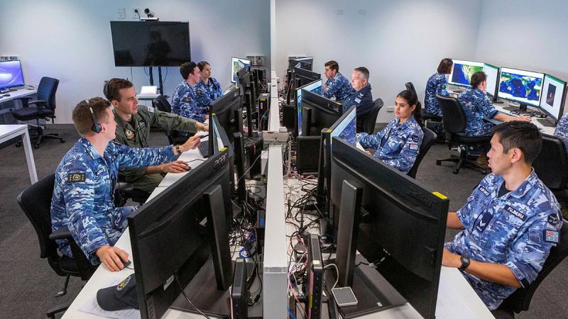 Air Force members of Distributed Ground Station – Australia at work in the lead-up to last year’s virtual Exercise Coalition Virtual Flag. Artificial intelligence is set to help intelligence analysts. Photo: Leading Aircraftwoman Jacqueline Forrester