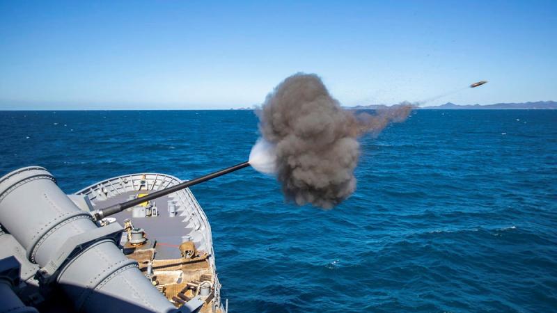 HMAS Ballarat conducts a five-inch gun firing while sailing off the coast of Queensland during Exercise Talisman Sabre. Photo: Leading Seaman Ernesto Sanchez