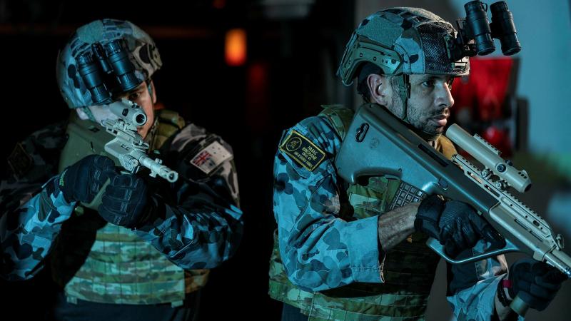 Able Seaman Boatswains Mate Jade Waipara, left, and Leading Seaman Boatswains Mate William Lete conduct quick-response force training on board HMAS Brisbane during Exercise Talisman Sabre. Photo: Leading Seaman Daniel Goodman