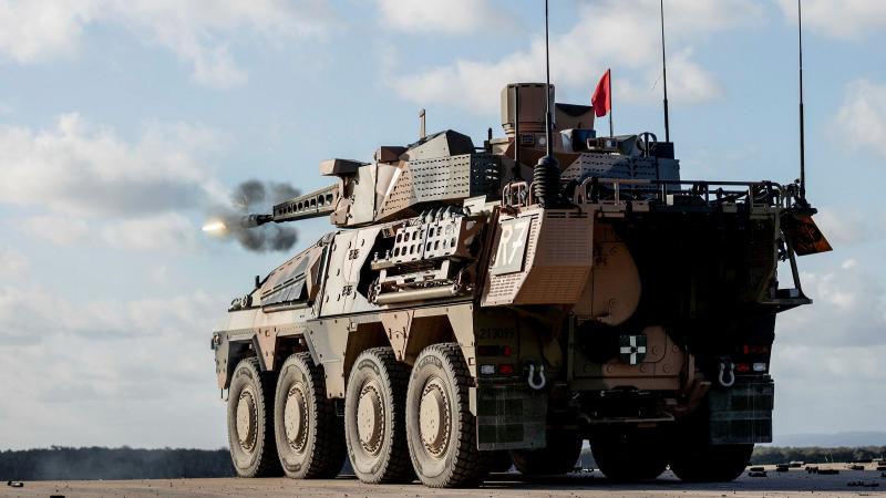 Soldiers from the 2nd/14th Light Horse Regiment (Queensland Mounted Infantry) conduct a live-fire shoot from a Boxer combat reconnaissance vehicle at the Wide Bay Training Area, Queensland. Photo: Leading Aircraftman John Solomon