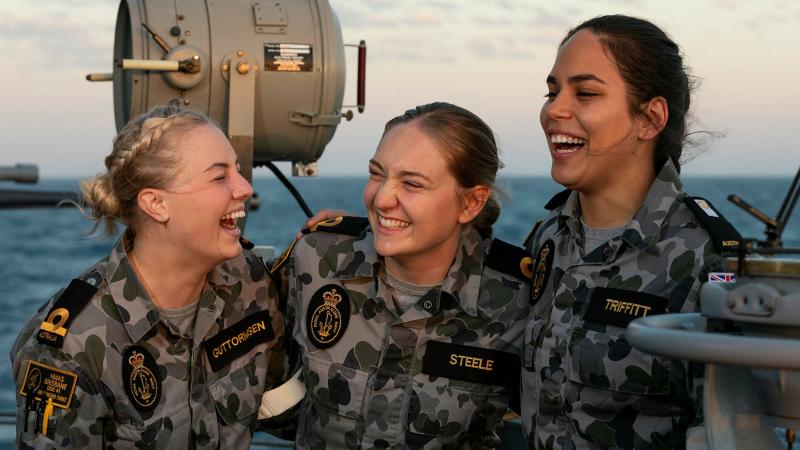 Sub Lieutenants Taylah Guttormsen, left, and Amy Steele and Midshipman Laura Triffitt are completing Phase 2 of their maritime warfare officer course aboard HMAS Brisbane during Exercise Talisman Sabre. Photo: Leading Seaman Daniel Goodman
